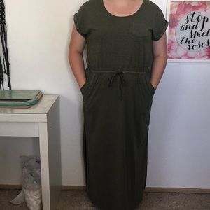 Full length green maxi dress.